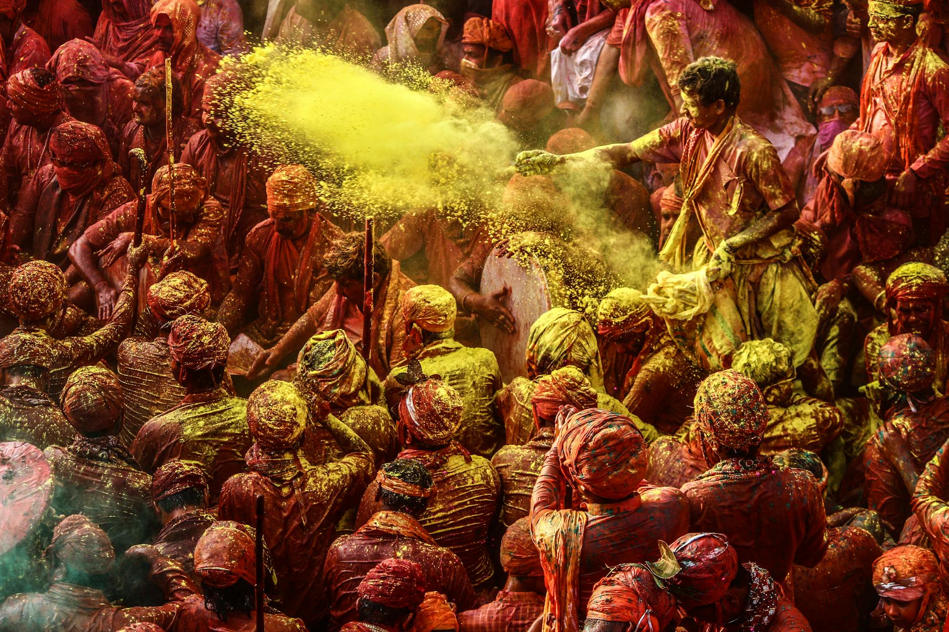 crowd of people covered in paint
